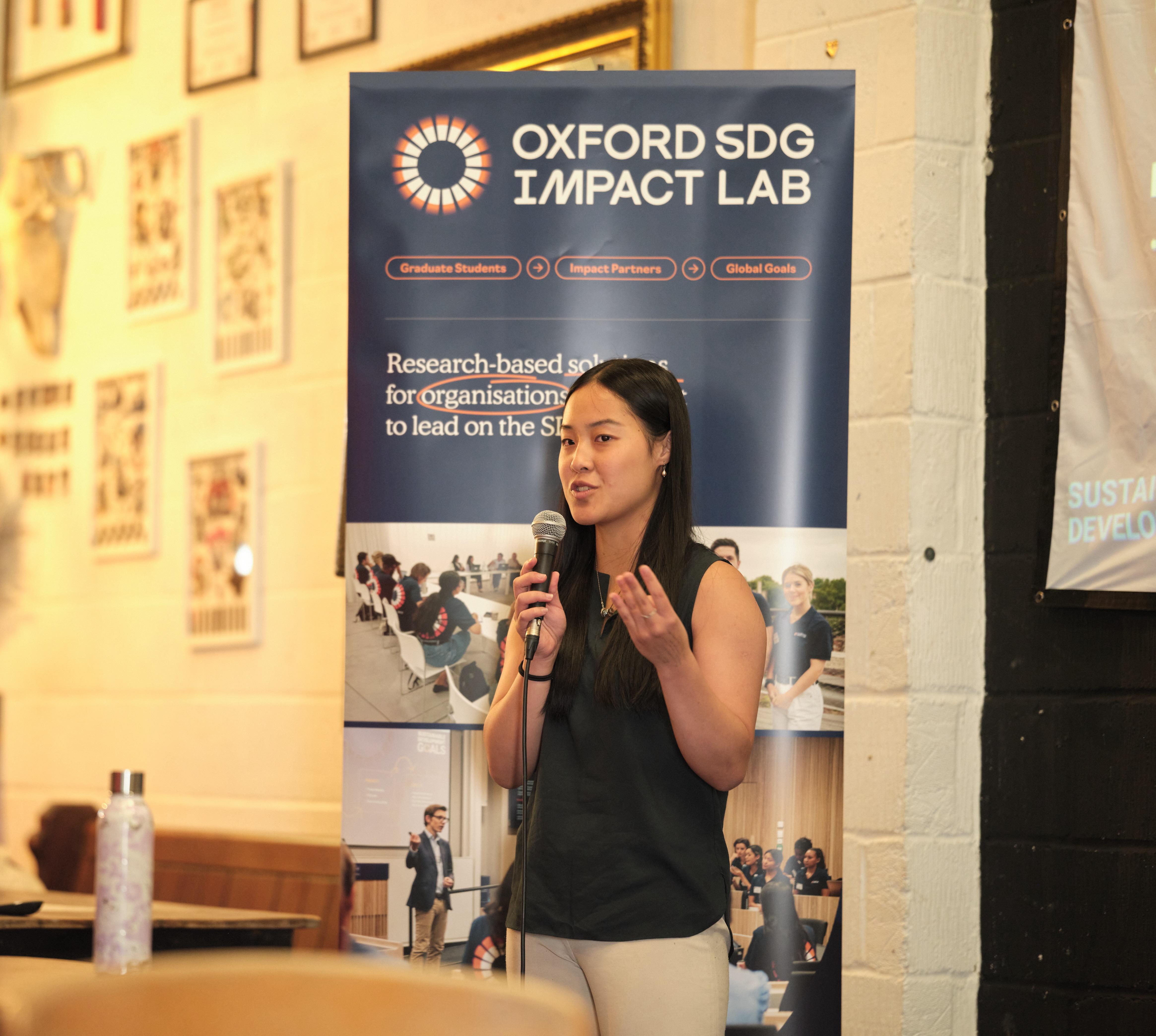 Emily Su presenting at the community impact lab showcase