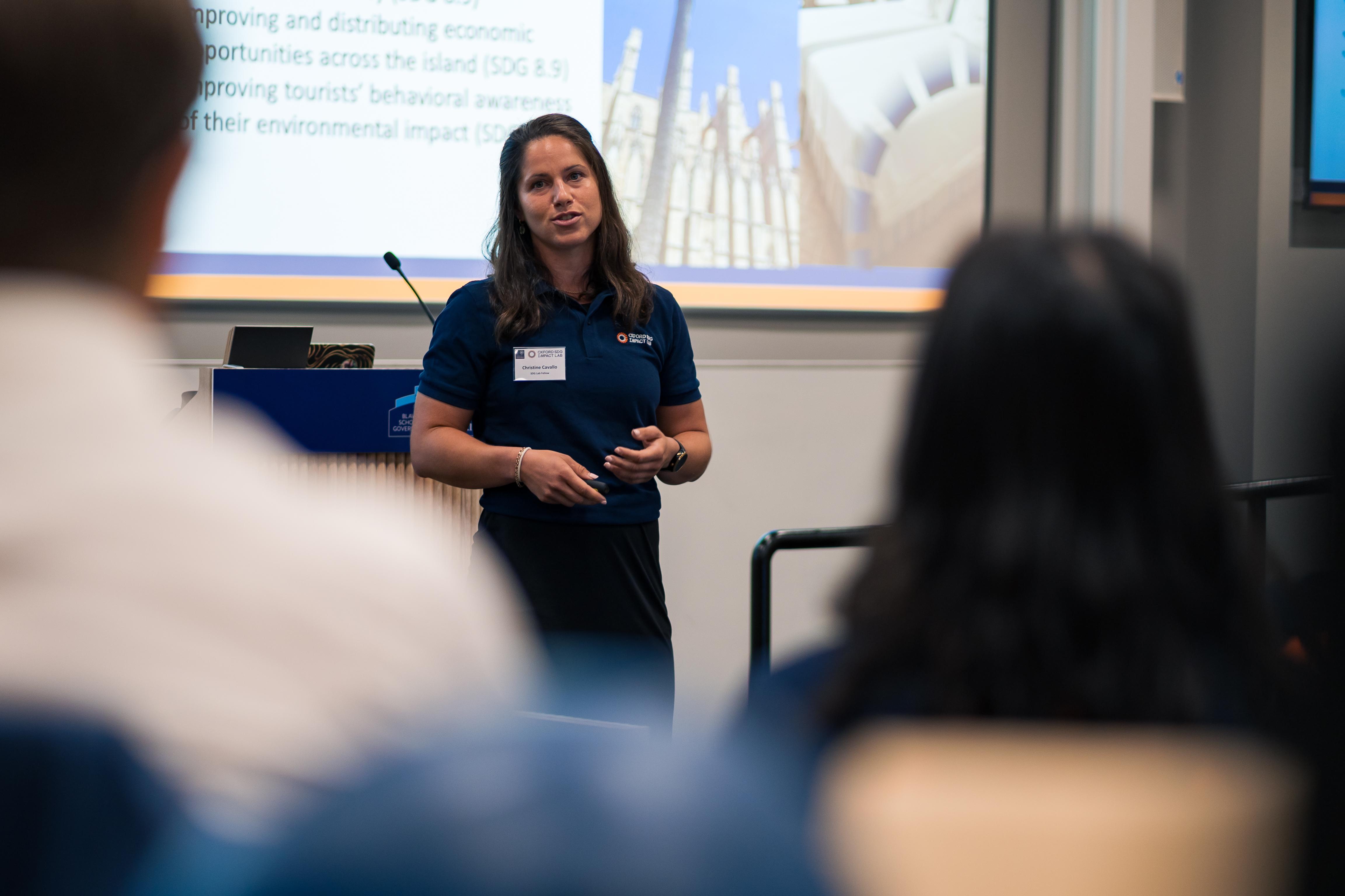 Christine Cavallo presenting in lecture theatre